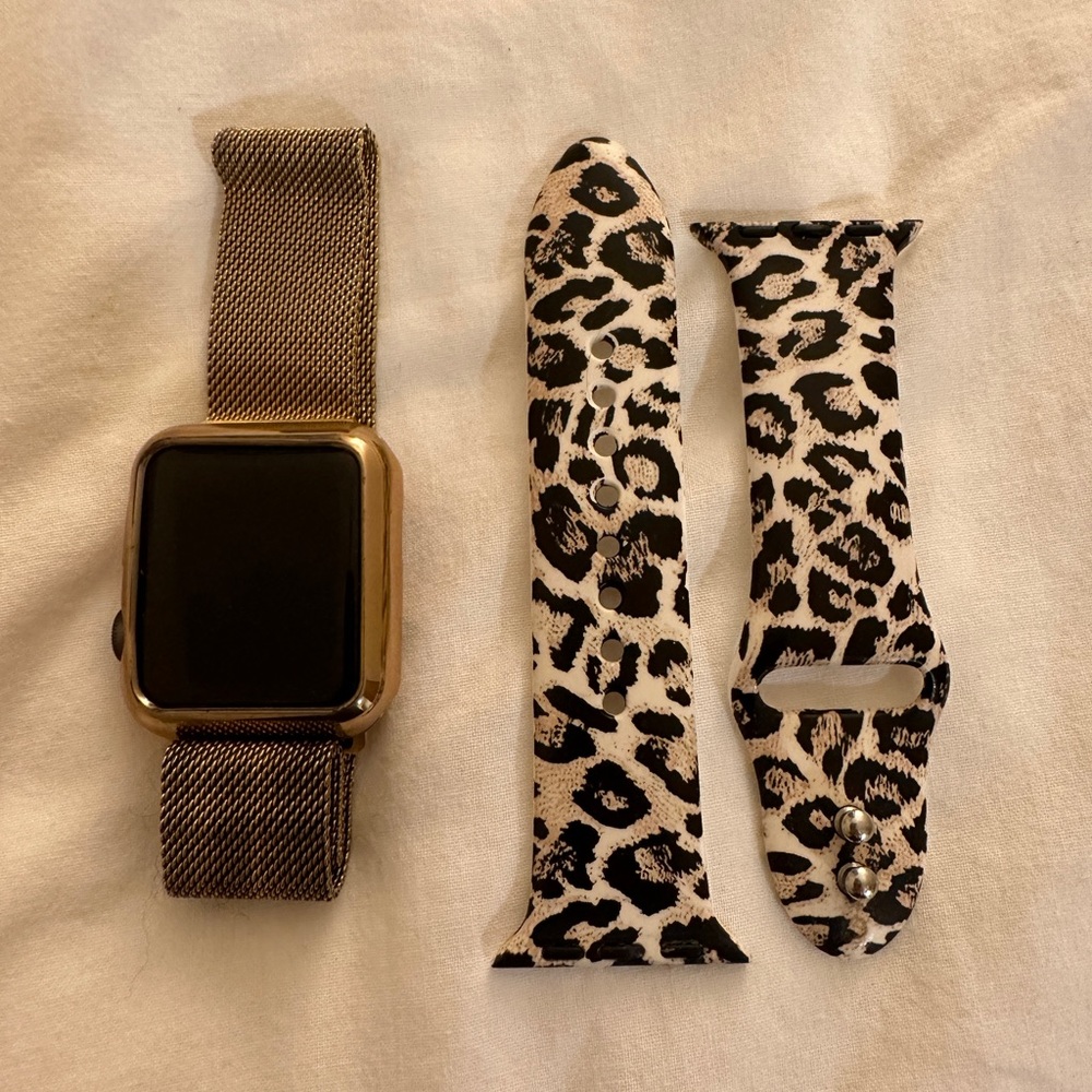 Apple Gold Tone Milanese Loop Watch with Black and Cream Leopard Band